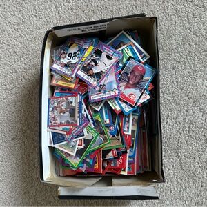 Old baseball cards with some football cards